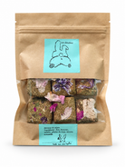 Gateaux de saison - les Doudous, sachet de gâteries pour lapins sur fond blanc
